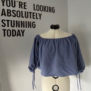 Off-shoulder blue and white blouse